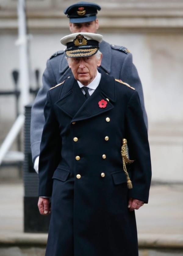 King Charles III and Prince William, in military uniforms, leading the Remembrance Day Parade to ho<em></em>nor fallen soldiers.
