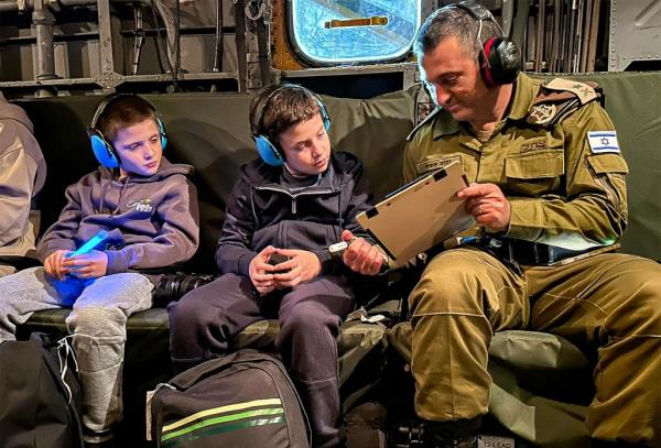 This handout picture released by the Israeli army on Nov. 27, 2023 shows hostages released by Hamas Gal. 