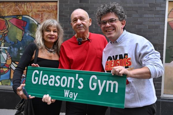 Gleason's Gym owner Bruce Silverglade, joined by his wife Jo Ellen Van Ouwerkerk and Council Member Lincoln Restler.