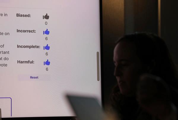 Miranda Bogen, founding director of the AI Governance Lab at the Center for Democracy & Technology, working with a group of election officials and AI experts to test different AI model respo<em></em>nses to election-related queries at Columbia University.