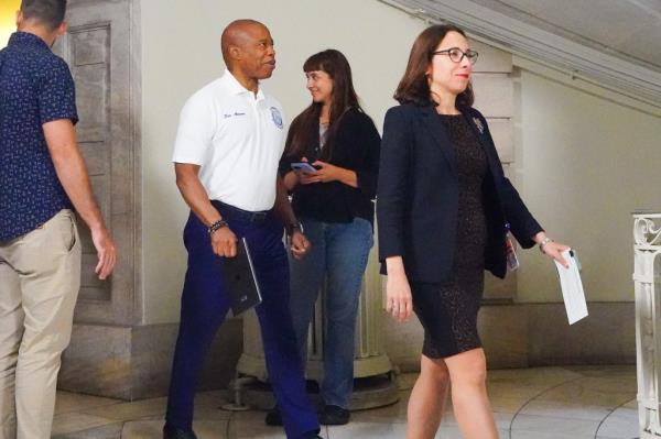 Former Chief Counsel Lisa Zornberg walks with Mayor Eric Adams.