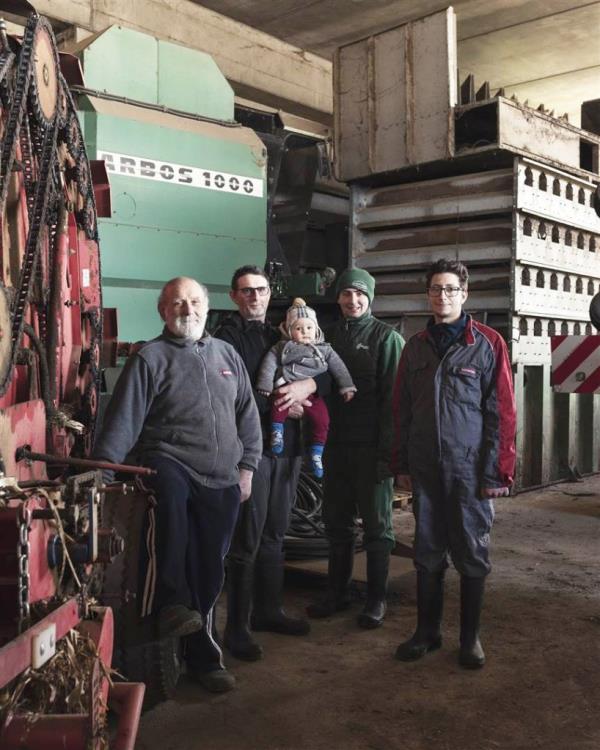 Giacomo Chiapparini (left), 74, from Romano di Lombardia, Italy, pictured with his family 