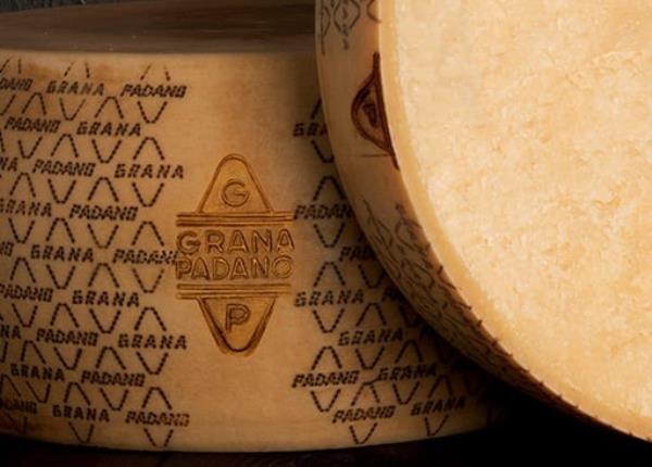 Each wheel of grana padano cheese weighs a<em></em>bout 90lbs