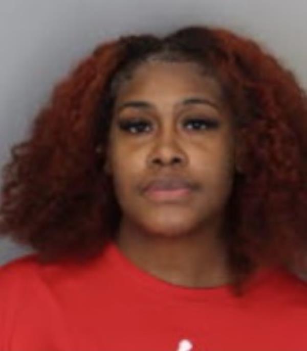Jasmine Moss, 30, is pictured in a mugshot.