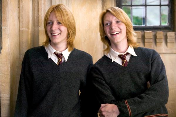 James and Oliver Phelps as Fred and George Weasley in 