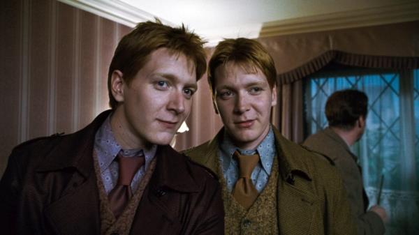 James and Oliver Phelps as Fred and George Weasley in 