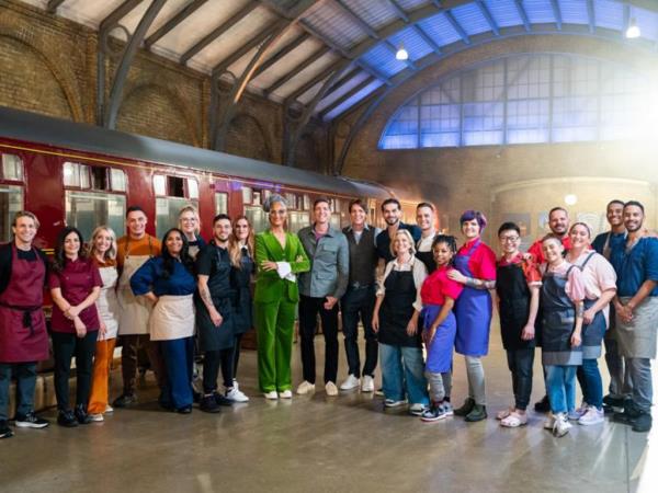 James and Oliver Phelps (center) with the nine teams of expert bakers. 