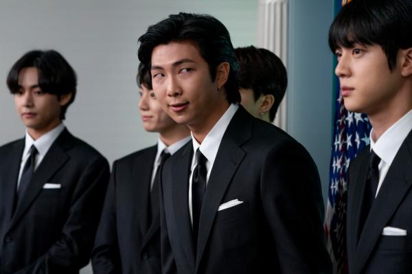 From left, V, Jungkook, RM, and Jin appear at a White House daily briefing during BTS' visit to Washington DC on Tuesday, May 31, 2021.