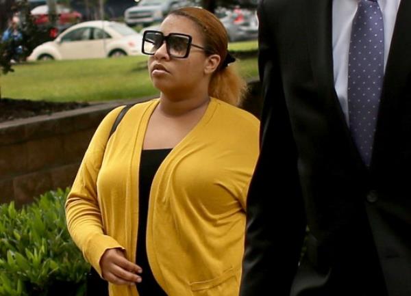 FILE - Deja Taylor arrives at federal court, June 12, 2023, in Virginia Beach, Va. Taylor, the mother of a 6-year-old who shot his teacher in Virginia, is expected to be sentenced Friday, Oct. 27, for felony child neglect, 10 mo<em></em>nths after her son used her handgun to critically wound the educator. (Stephen M. Katz/The Virginian-Pilot via AP, File)