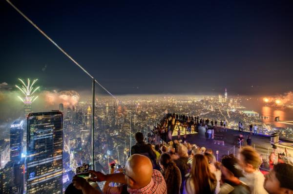 Guests watching the fireworks at the Edge at Hudson Yard's 4th of July Celebration in New York City, 2021