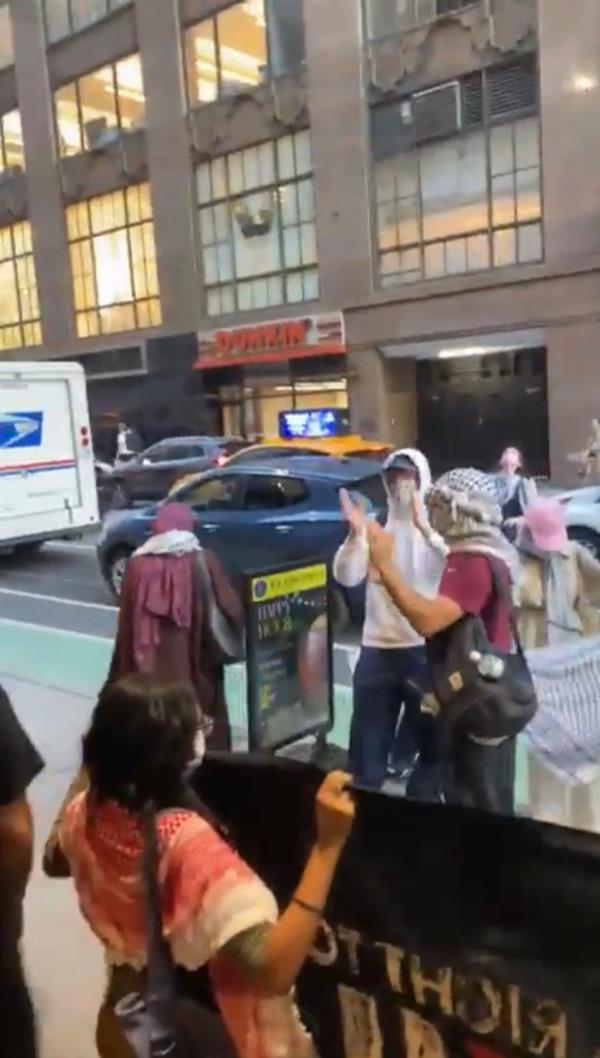 Clips of the protest, uploaded by the Safe Campus Jewish advocacy group, show the masked demo<em></em>nstrators marching up and down the restaurant as they chanted antisemitic slogans at the students. 