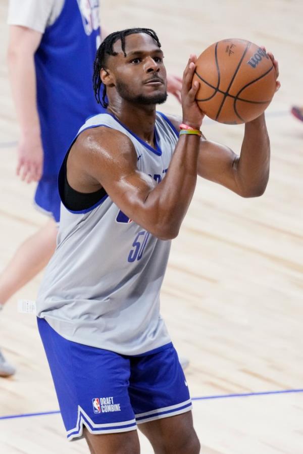 Bro<em></em>nny James shooting a free throw during the 2024 NBA basketball Draft Combine in Chicago