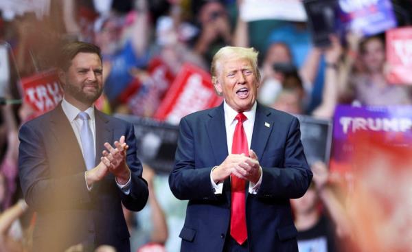 Republican presidential nominee and former U.S. President Do<em></em>nald Trump stands with Republican vice presidential nominee U.S. Senator J.D. Vance (R-OH), as he holds a rally.