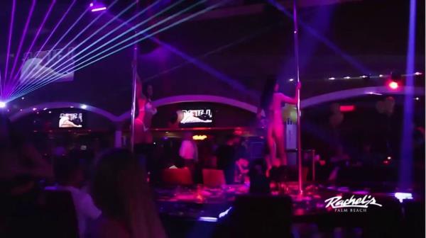 Two exotic dancers on stage at Rachel's strip club in Palm Beach.