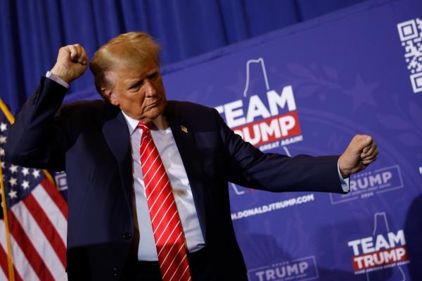Trump dances off stage at the end of a campaign rally at the Grappone Co<em></em>nvention Center on January 19, 2024 in Concord, New Hampshire.