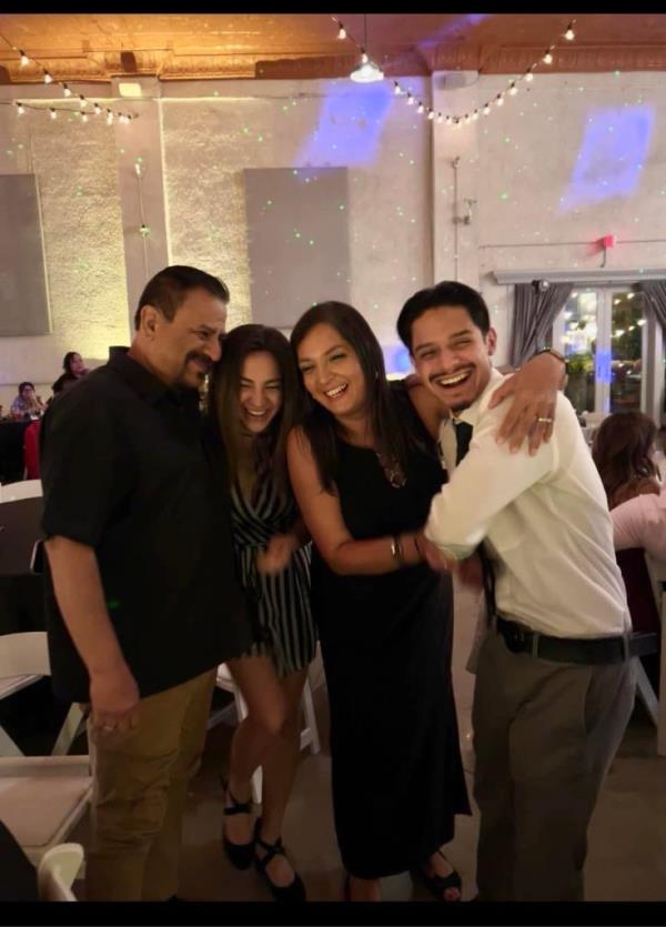 Portrait of Lisa Lopez-Galvan, a shooting victim at a parade, seen laughing with loved o<em></em>nes at a celebration.
