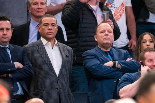 Knicks President Leon Rose at right with GM Scott Perry sit in there seats