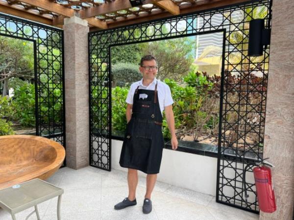 Lawrie Chandler grilling.