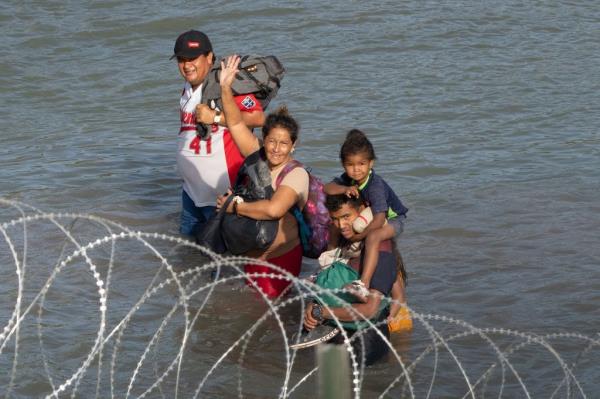 Many migrants are ferried across the US-Mexican border by smugglers known as 