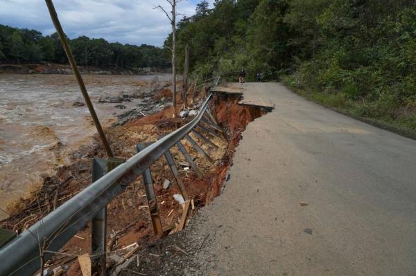 Damage at the Asheville Highway near the Nolichucky River.