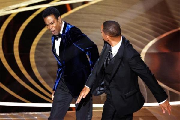 Will Smith hits Chris Rock at the 94th Academy Awards in 2022 