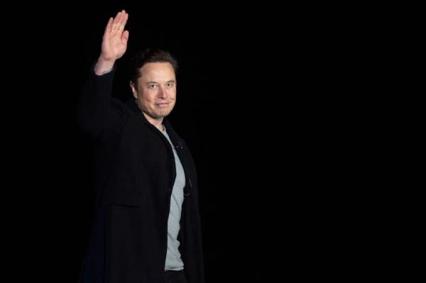 Tesla CEO Elon Musk nearly ran a red light while testing his company's new self-driving software through the streets of the San Francisco Bay Area on Friday.