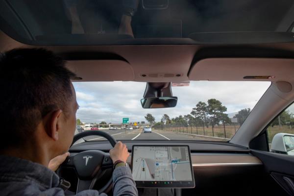 Musk was testing the latest version of Tesla' Full Self-Driving system. The image above shows a Tesla driver using a beta version of the FSD system in 2021.