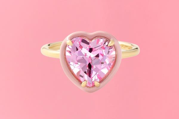 A pink heart-shaped ring featured in a gift guide cover