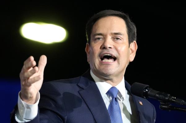 Senator Marco Rubio, R-Fla., speaking into a microphone in West Palm Beach, Florida, being a top co<em></em>ntender as running mate for former President Do<em></em>nald Trump in the 2024 election