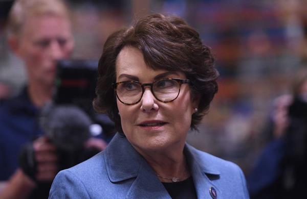 U.S. Senator Jacky Rosen, a woman wearing glasses and a blue jacket, visiting Drago<em></em>nfly Energy in Reno on July 2, 2024.
