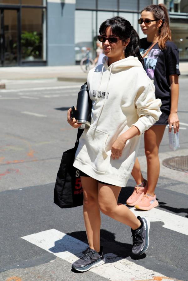 Camila Cabello and her two friends in Taylor Swift sweatshirts walking home from the gym in New York City