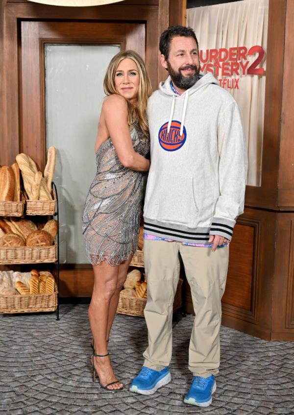 Actors Jennifer Aniston and Adam Sandler posing at the Los Angeles Premiere of Netflix's 'Murder Mystery 2'
