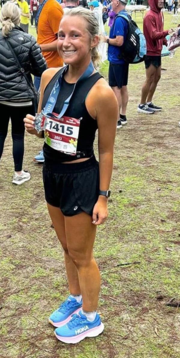 Lexie Firment with medal