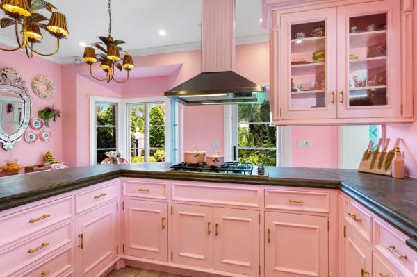 Interior of the home's pink kitchen. 