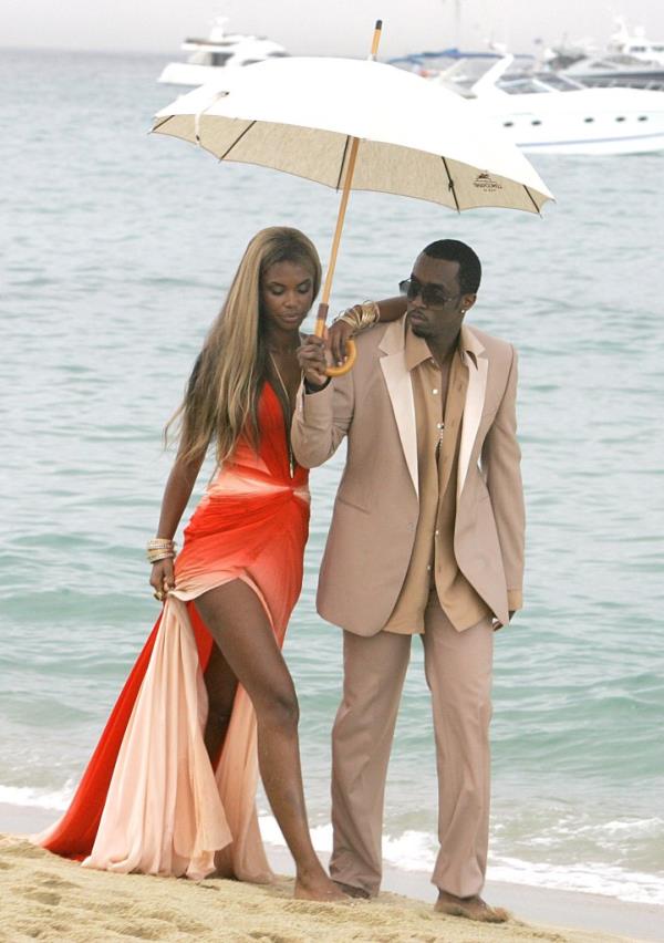 Sean 'P.Diddy' Combs shooting a commercial for Estee Lauder on a beach in Saint-Tropez, France, alo<em></em>ngside a woman under an umbrella