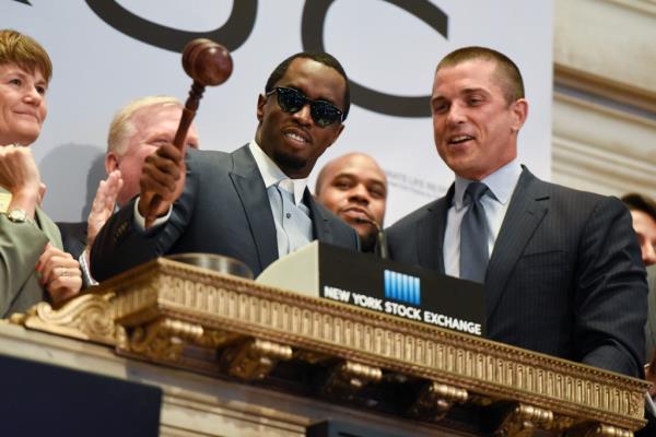 Sean 'Diddy' Combs, President Diageo North America Dierdre Mahlan, and President NYSE Group Tom Farley ringing the NYSE Closing Bell