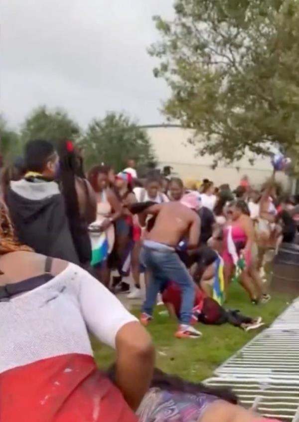Crowds rushing at a scene of a shooting in Boston