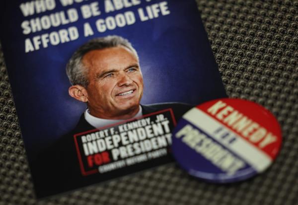 A campaign brochure for Presidential candidate Robert F. Kennedy, Jr. is seen as he speaks at the Libertarian Natio<em></em>nal Co<em></em>nvention on May 24, 2024 in Washington, DC.