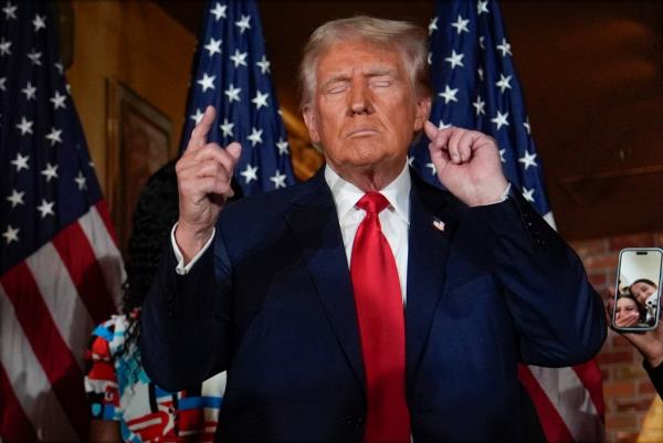 Republican presidential nominee former President Do<em></em>nald Trump listens to questions from reporters at a campaign event at ll Toro E La Capra.