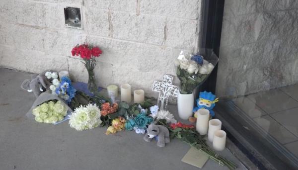 A vigil outside the mall