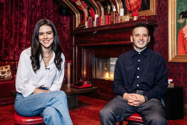 Lydia Moynihan and Eugene Remm sitting in the Red Room at Catch Steak in Manhattan, photographed on October 2, 2024.