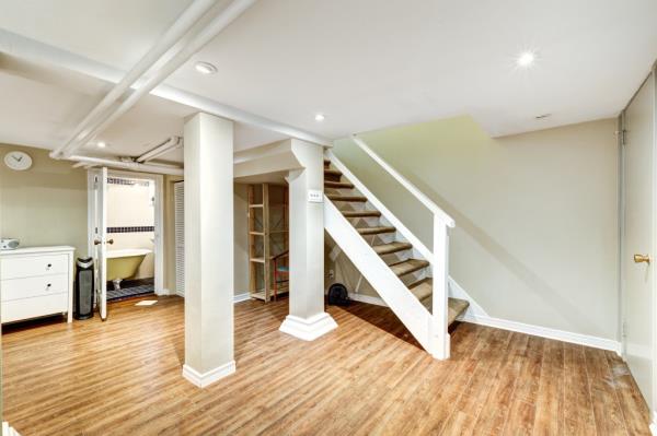 A room with stairs and a tub in a real estate property in Montreal, Quebec, Canada