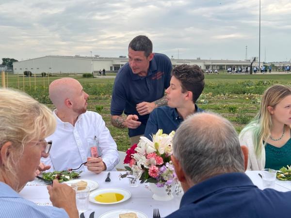 Greg Sigelmier speaks to attendees at the dinner party held on Aug. 15, 2024.