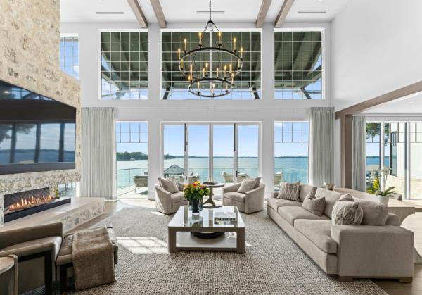 The 12,002-square-foot 19125 Peninsula Point listing dazzles with water views.