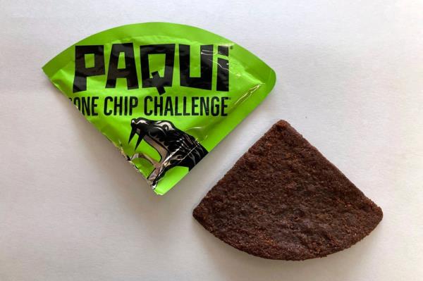 A Paqui One Chip Challenge chip is displayed in Boston, Friday, Sept. 8, 2023.
