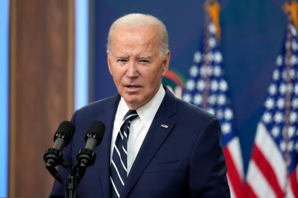 President Joe Biden speaking at podium in Washington on April 12, 2024