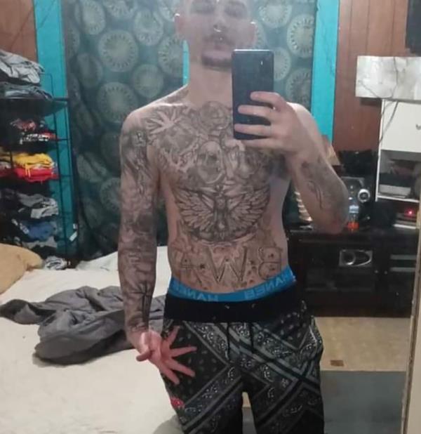 Trent Thompson shows off his tattoos 