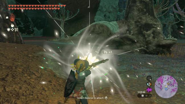 l<em></em>ink fusing a Star Fragment to an arrow in The Legend of Zelda: Tears of the Kingdom.